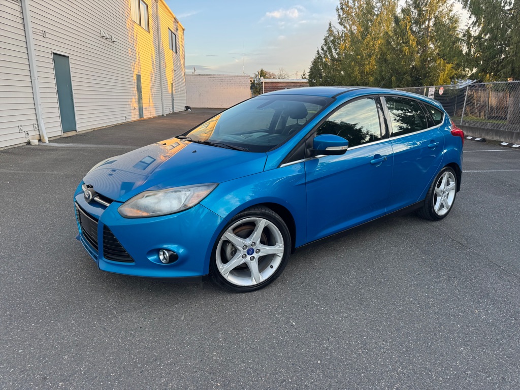 Blue 2012 Ford Focus Titanium Hatchback Hatchback Front-Wheel Drive Automatic