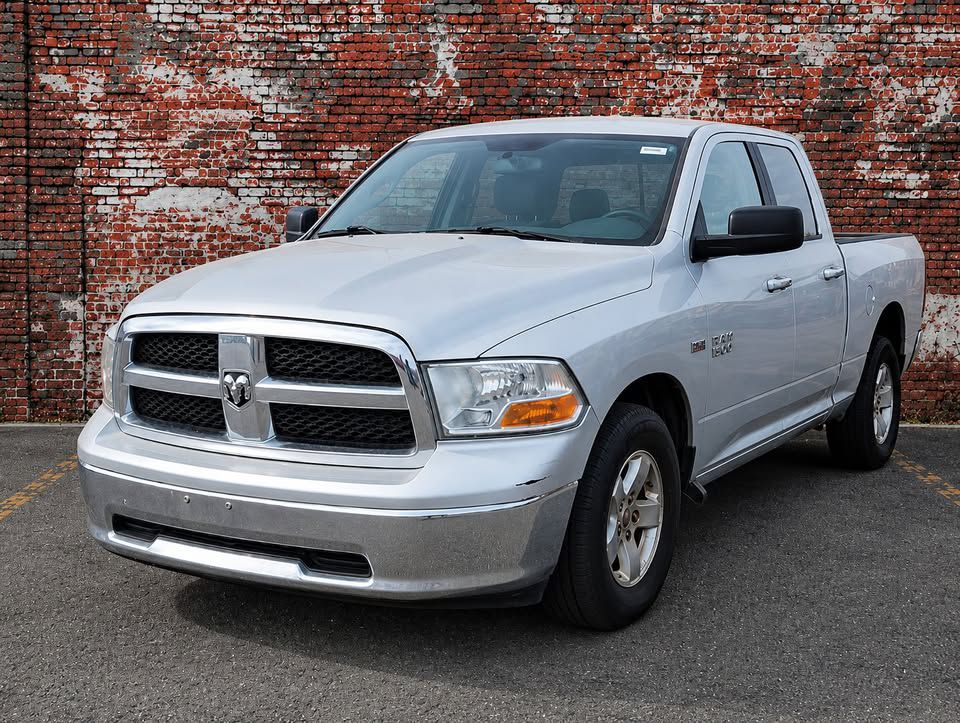 Silver 2010 Dodge RAM 1500 SLT Quad Cab 4WD Pickup Truck Four-Wheel Drive Automatic