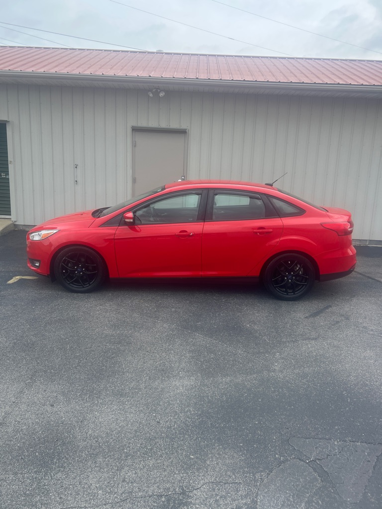Red 2016 Ford Focus Sedan Front-Wheel Drive Automatic