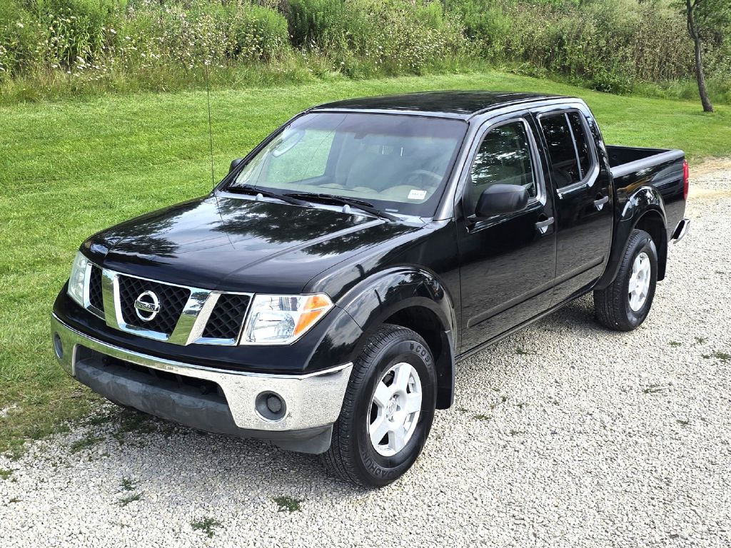 Black 2005 Nissan Frontier Pickup Truck Four-Wheel Drive 6-Speed Manual