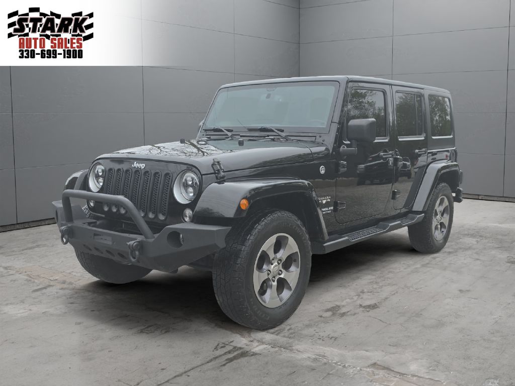 2016 JEEP WRANGLER UNLIMI SAHARA for sale at Stark Auto Sales