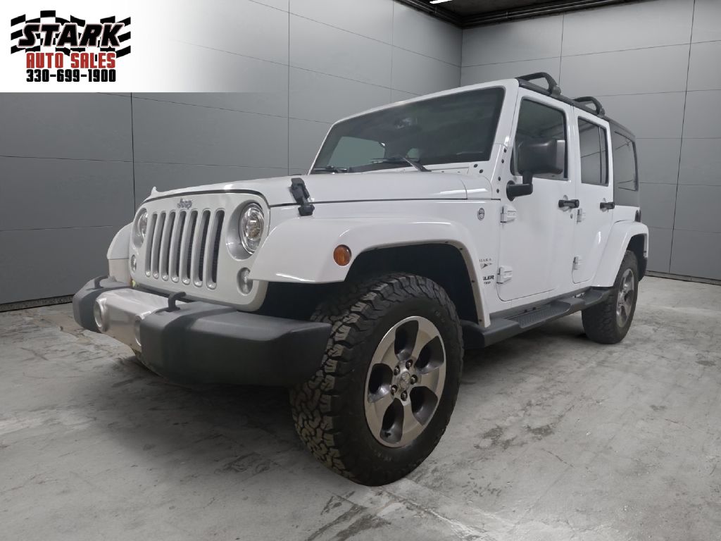 2017 JEEP WRANGLER UNLIMI SAHARA for sale at Stark Auto Sales