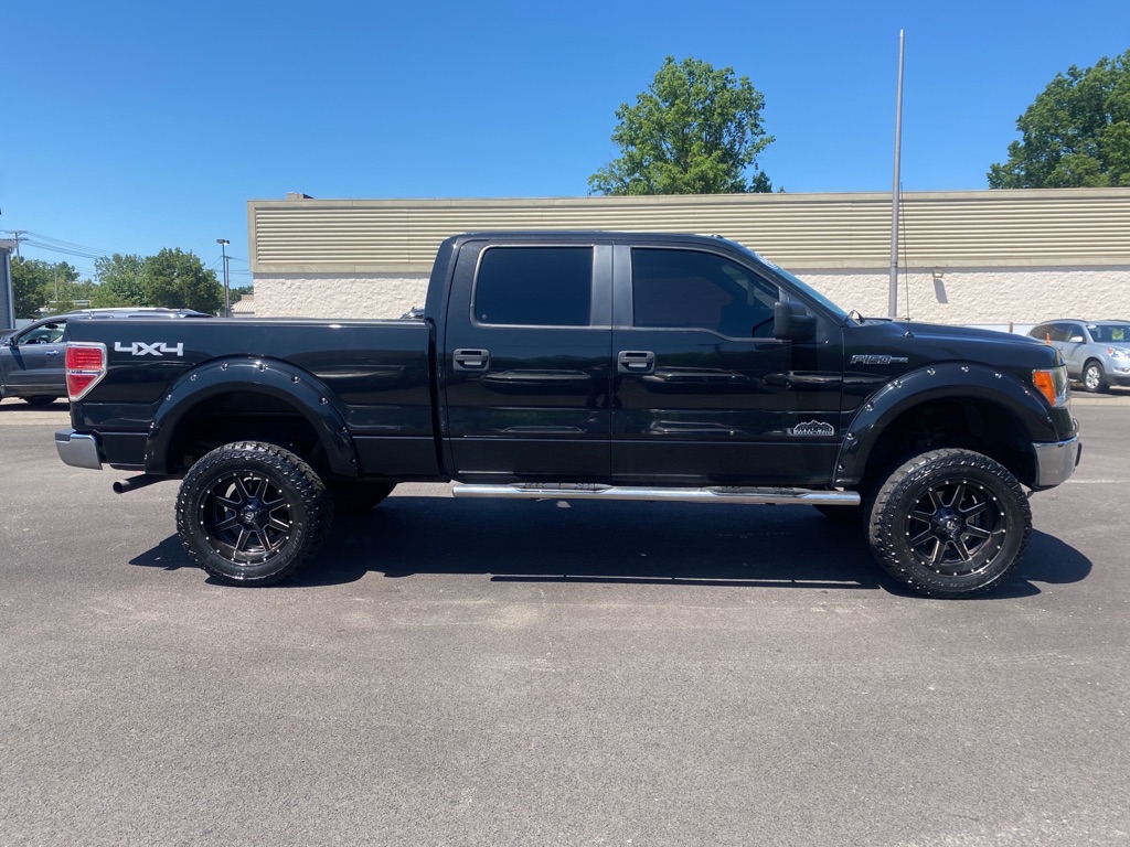 2013 FORD F150 SUPERCREW for sale at TKP Auto Sales