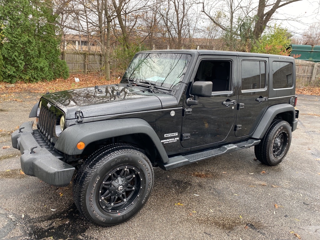 2013 JEEP WRANGLER UNLIMI for sale at TKP Auto Sales