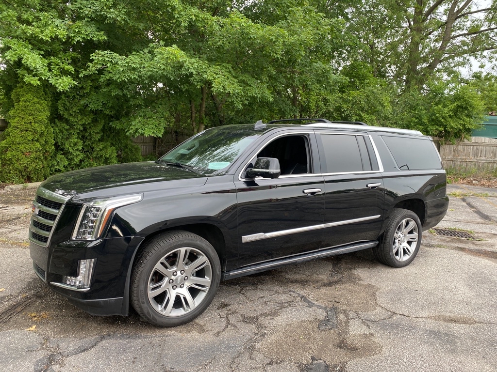 What is the fair price for a 2015 Cadillac Escalade?, image size:1024x768