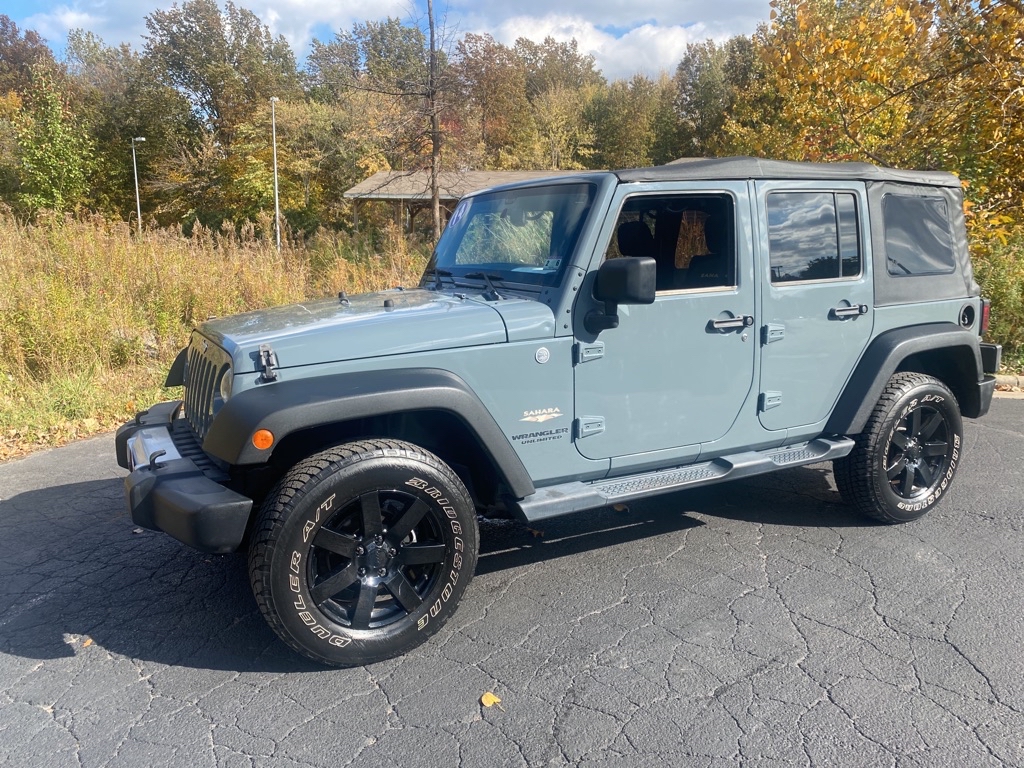 2014 JEEP WRANGLER UNLIMI for sale at TKP Auto Sales