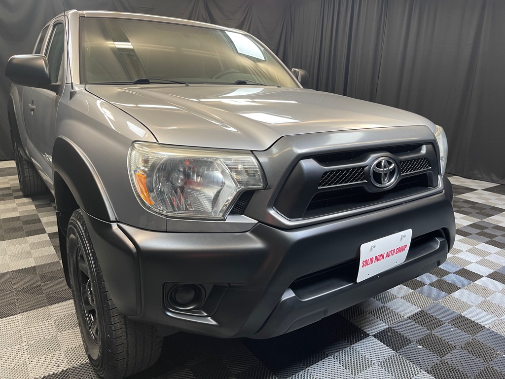 2014 TOYOTA TACOMA for sale at Solid Rock Auto Group