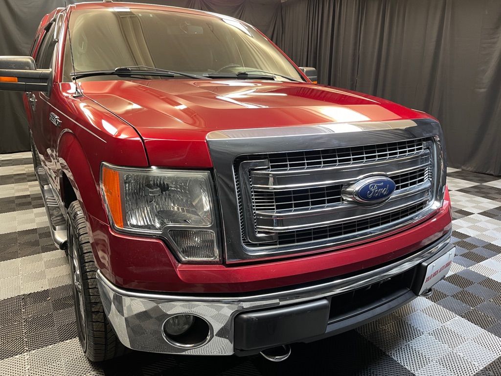 2014 FORD F150 for sale at Solid Rock Auto Group