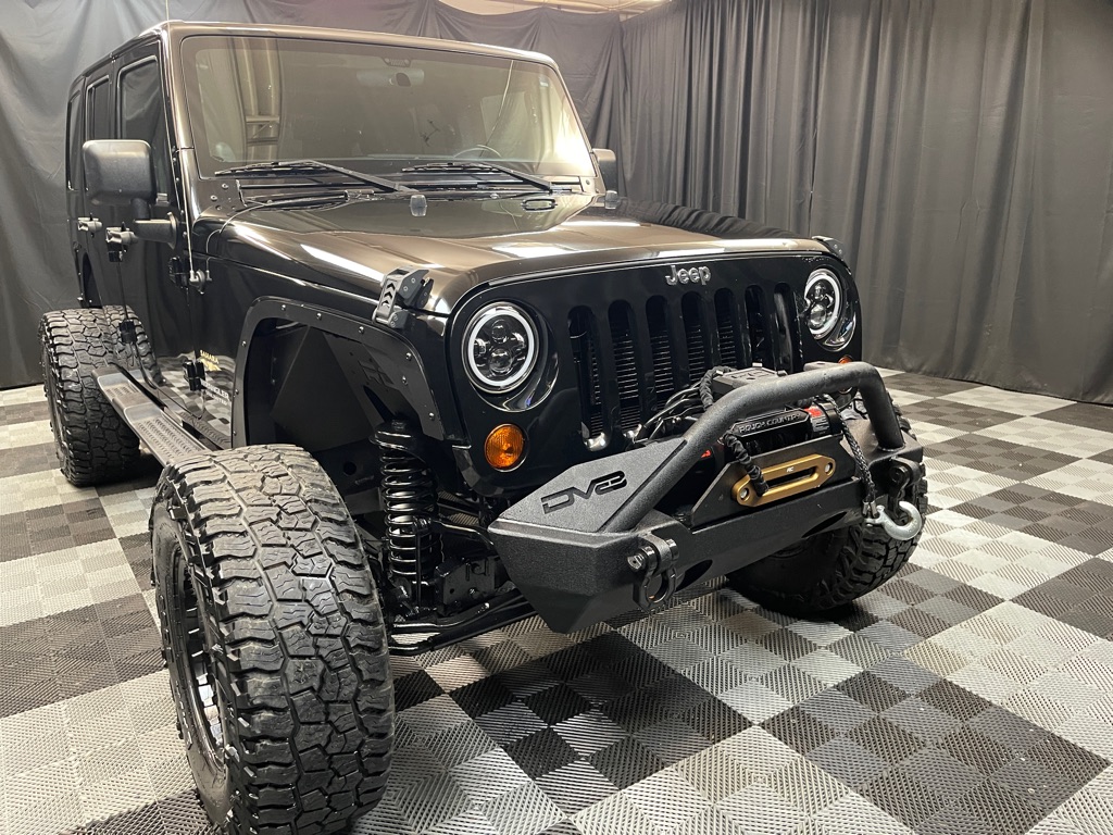 2012 JEEP WRANGLER UNLIMI for sale at Solid Rock Auto Group