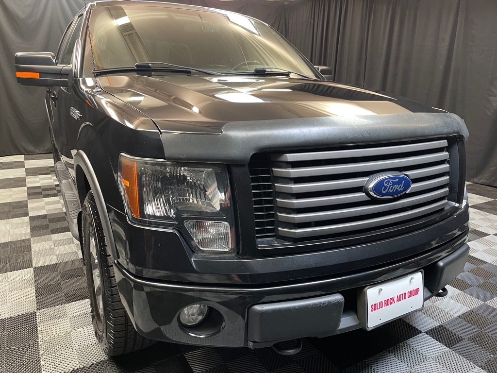 2012 FORD F150 for sale at Solid Rock Auto Group