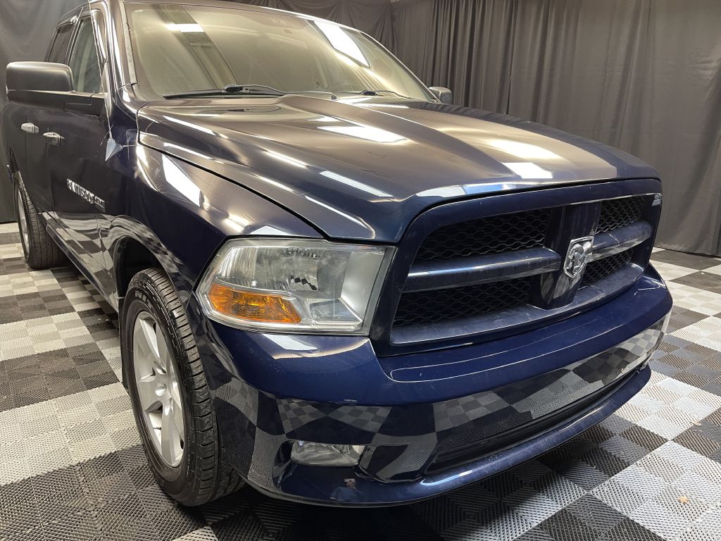 2012 DODGE RAM 1500 for sale at Solid Rock Auto Group