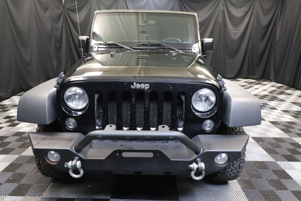 2015 JEEP WRANGLER UNLIMI SPORT for sale at Solid Rock Auto Group