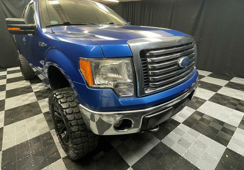 2011 FORD F150 for sale at Solid Rock Auto Group