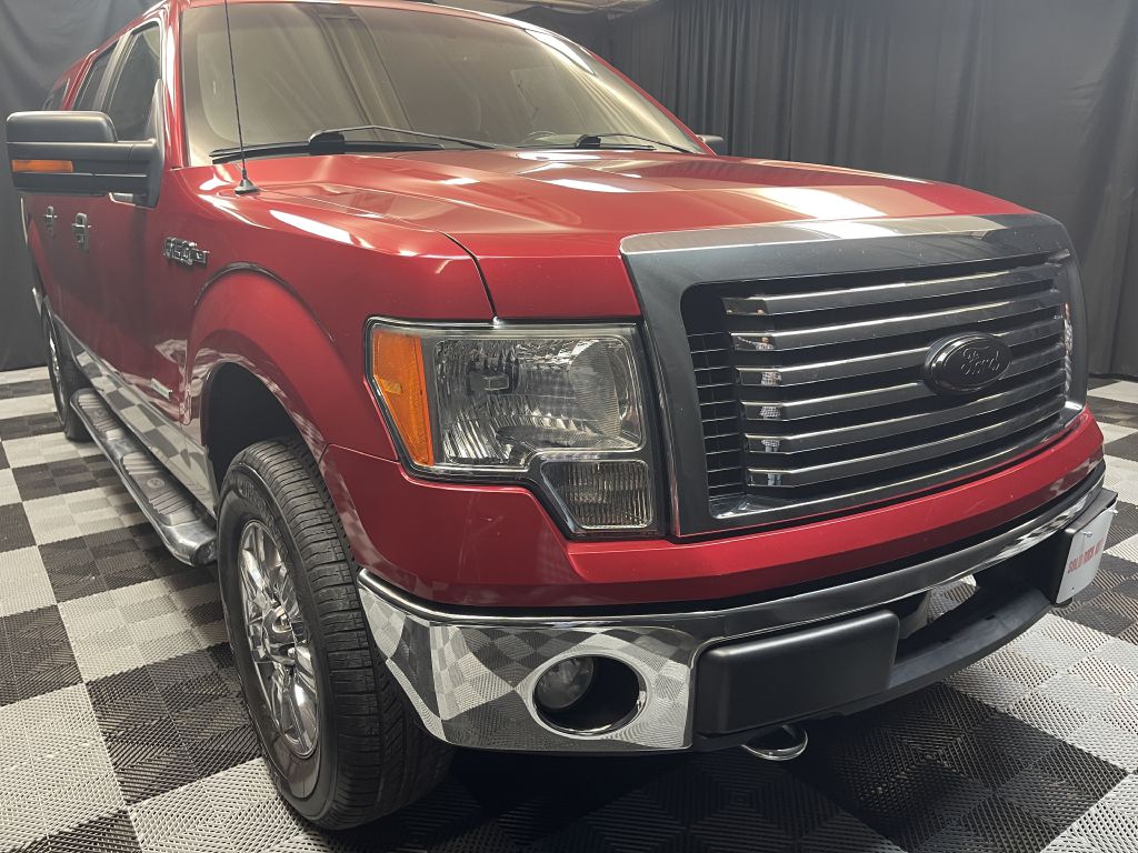 2011 FORD F150 SUPERCREW for sale at Solid Rock Auto Group