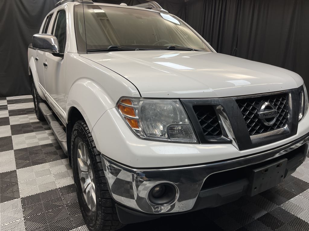 2012 NISSAN FRONTIER for sale at Solid Rock Auto Group