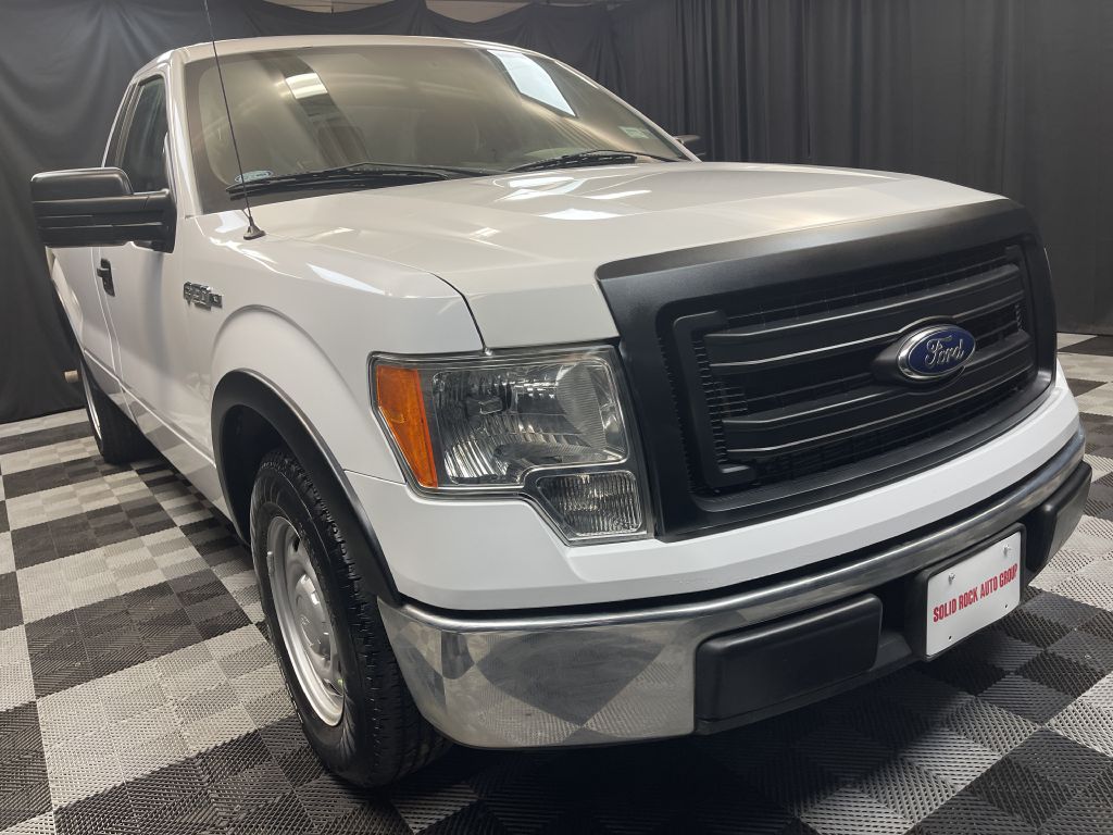 2014 FORD F150 for sale at Solid Rock Auto Group
