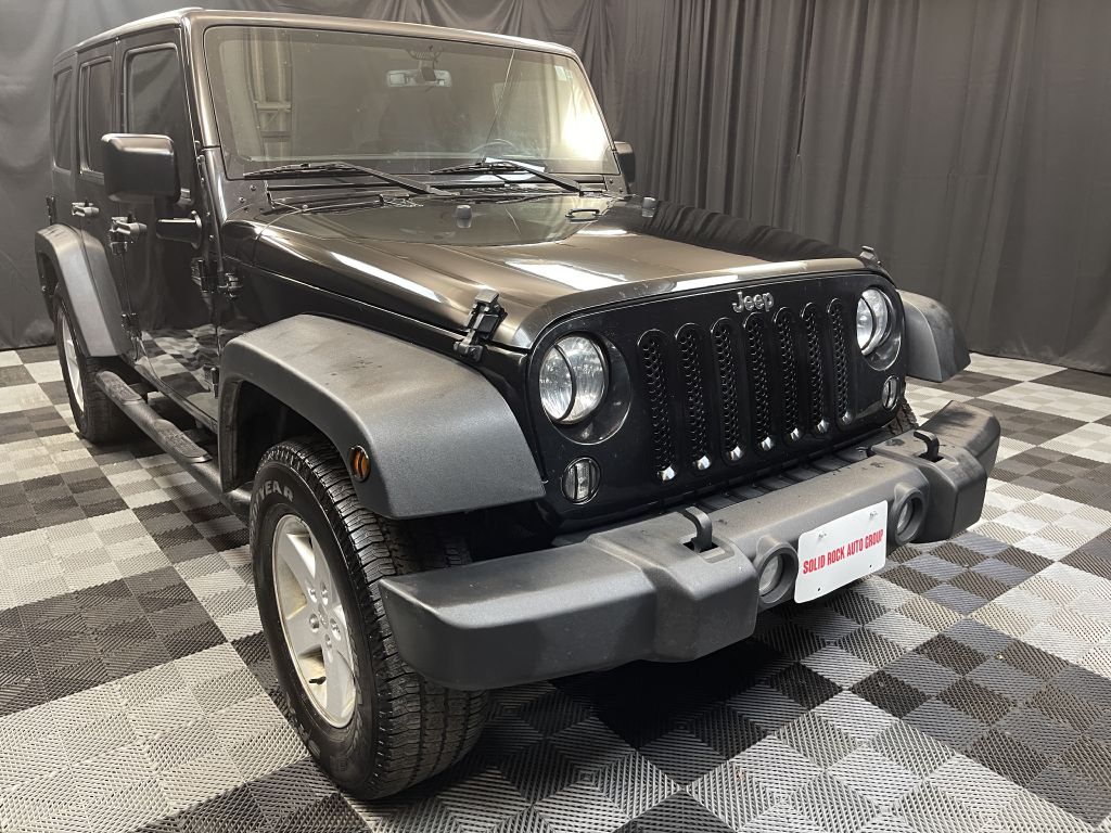 2017 JEEP WRANGLER UNLIMI SPORT for sale at Solid Rock Auto Group