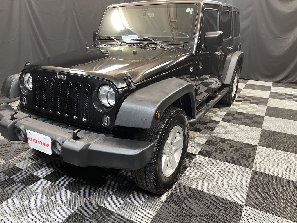 2017 JEEP WRANGLER UNLIMI SPORT for sale at Solid Rock Auto Group
