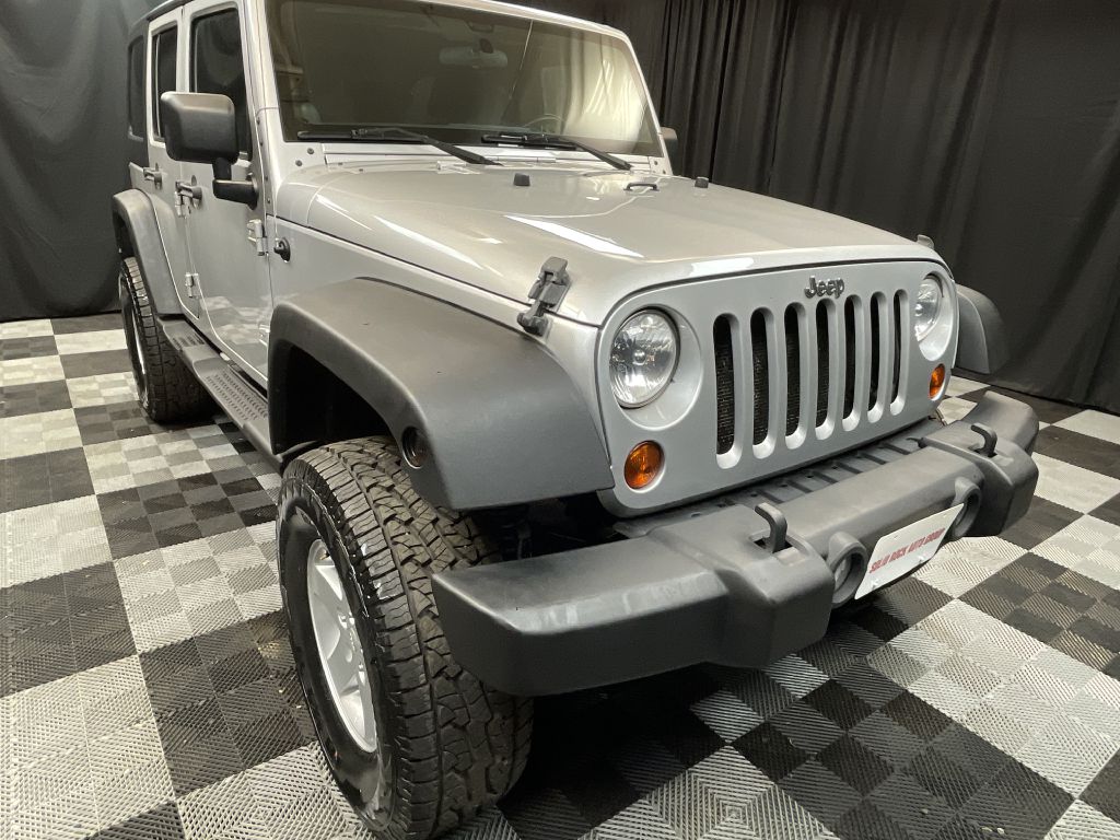 2011 JEEP WRANGLER UNLIMI for sale at Solid Rock Auto Group