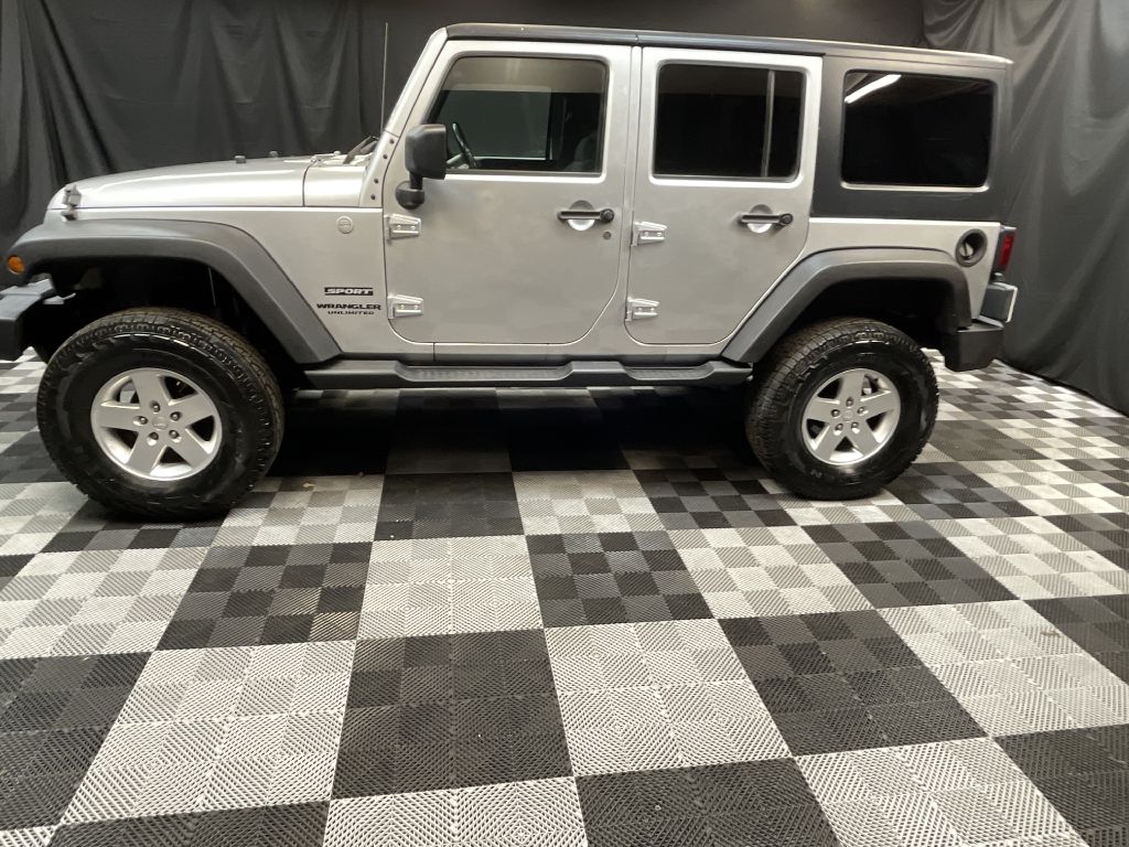 2011 JEEP WRANGLER UNLIMI SPORT for sale at Solid Rock Auto Group
