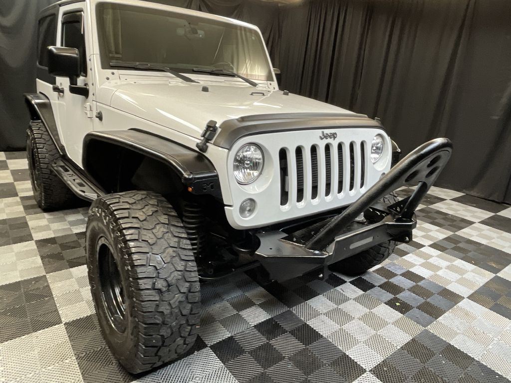 2015 JEEP WRANGLER for sale at Solid Rock Auto Group