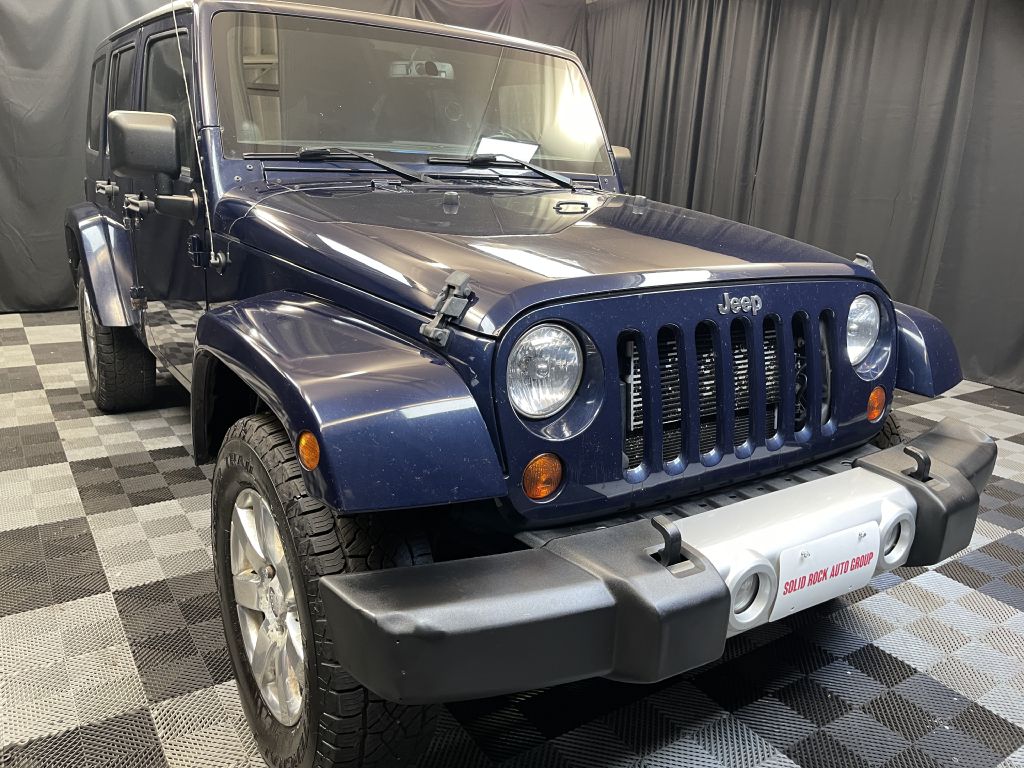 2013 JEEP WRANGLER UNLIMI for sale at Solid Rock Auto Group