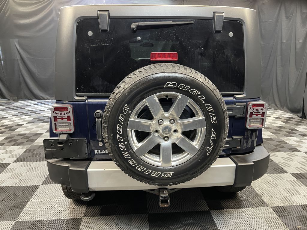 2013 JEEP WRANGLER UNLIMI SAHARA for sale at Solid Rock Auto Group