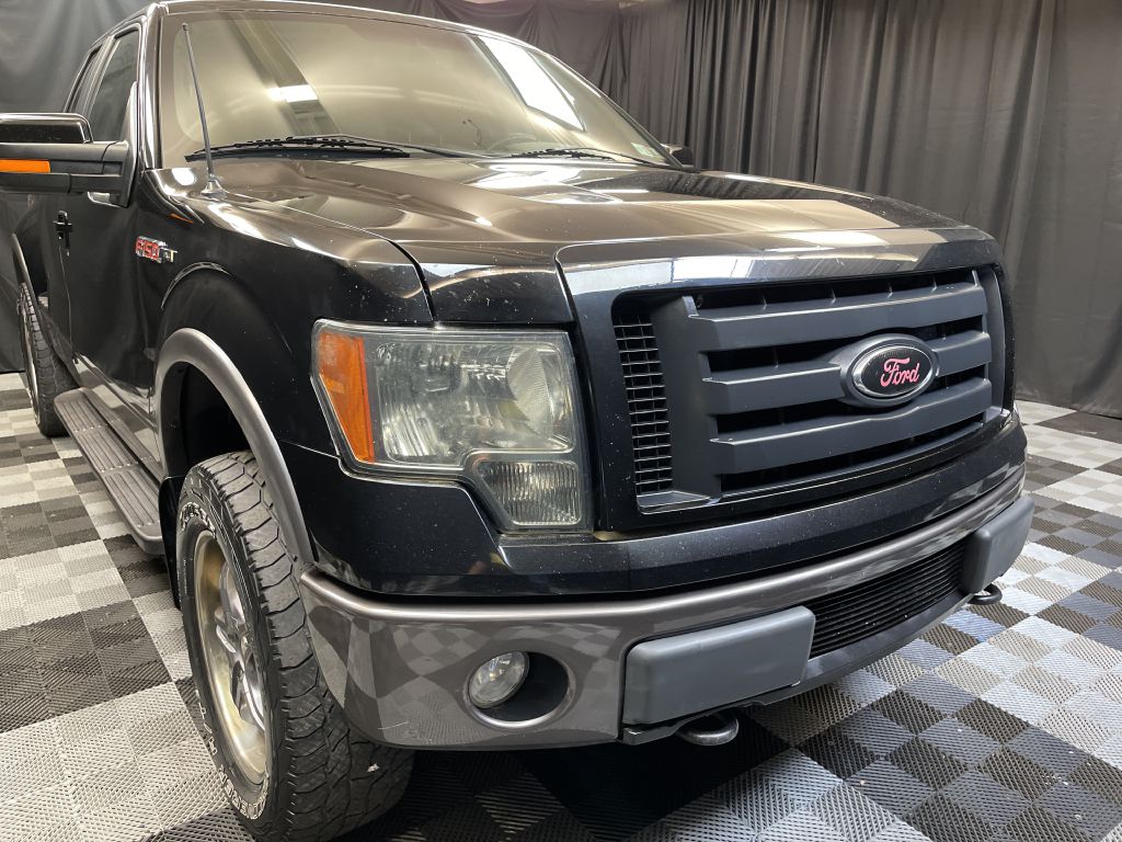 2009 FORD F150 SUPER CAB FX4 for sale at Solid Rock Auto Group