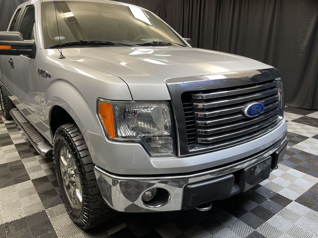2011 FORD F150 for sale at Solid Rock Auto Group