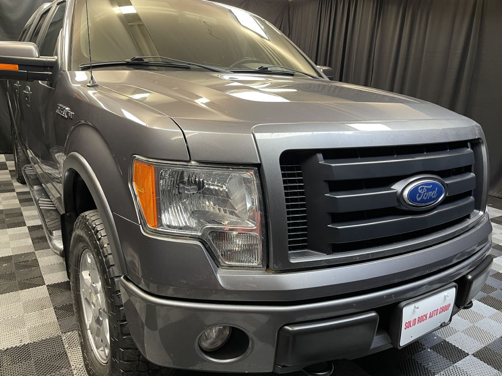 2010 FORD F150 for sale at Solid Rock Auto Group