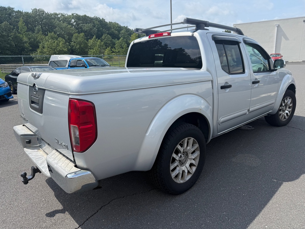 Silver Lightning Metallic 2011 Nissan Frontier Pickup Truck Four-Wheel Drive 5-Speed Automatic Overdrive