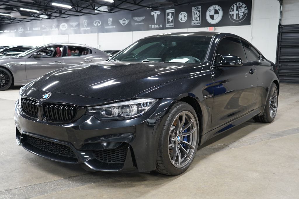 Black Sapphire Metallic 2018 BMW M4 Coupe RWD Coupe Rear-Wheel Drive 6-Speed Manual