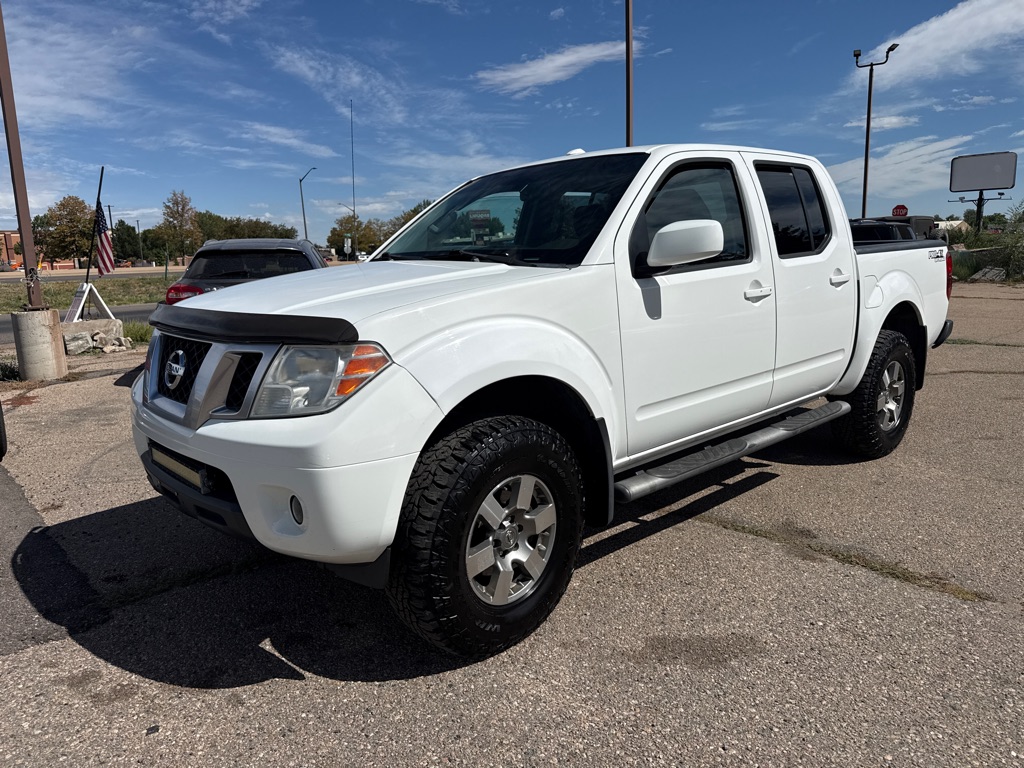 White 2013 Nissan Frontier Pickup Truck Four-Wheel Drive Automatic