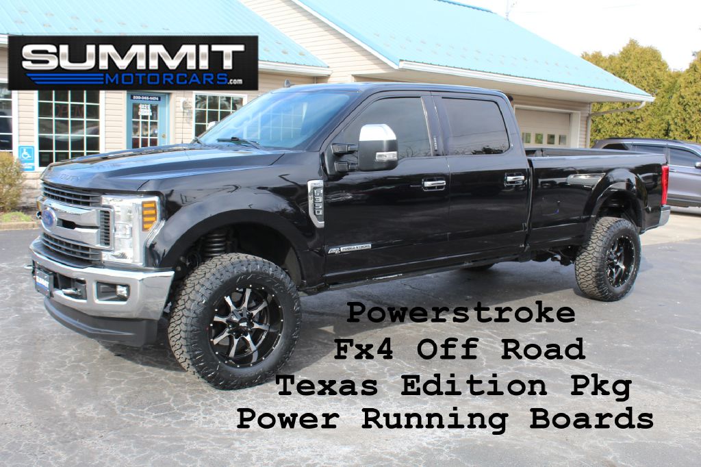 2014 FORD F250 LARIAT FX4 4x4 LARIAT FX4 POWERSTROKE for sale at Summit Motorcars