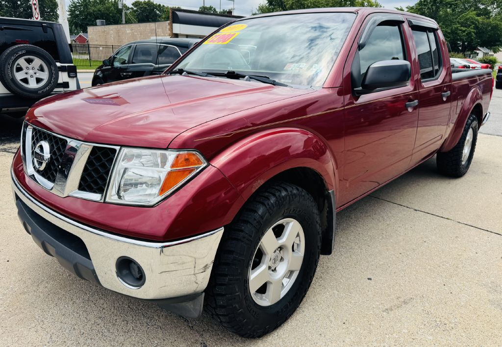 Red 2007 Nissan Frontier Pickup Truck Four-Wheel Drive Automatic