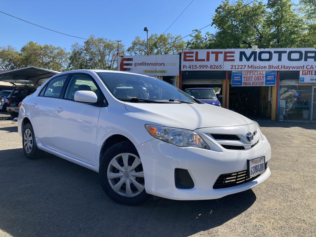 White 2011 Toyota Corolla LE Sedan Front-Wheel Drive Automatic