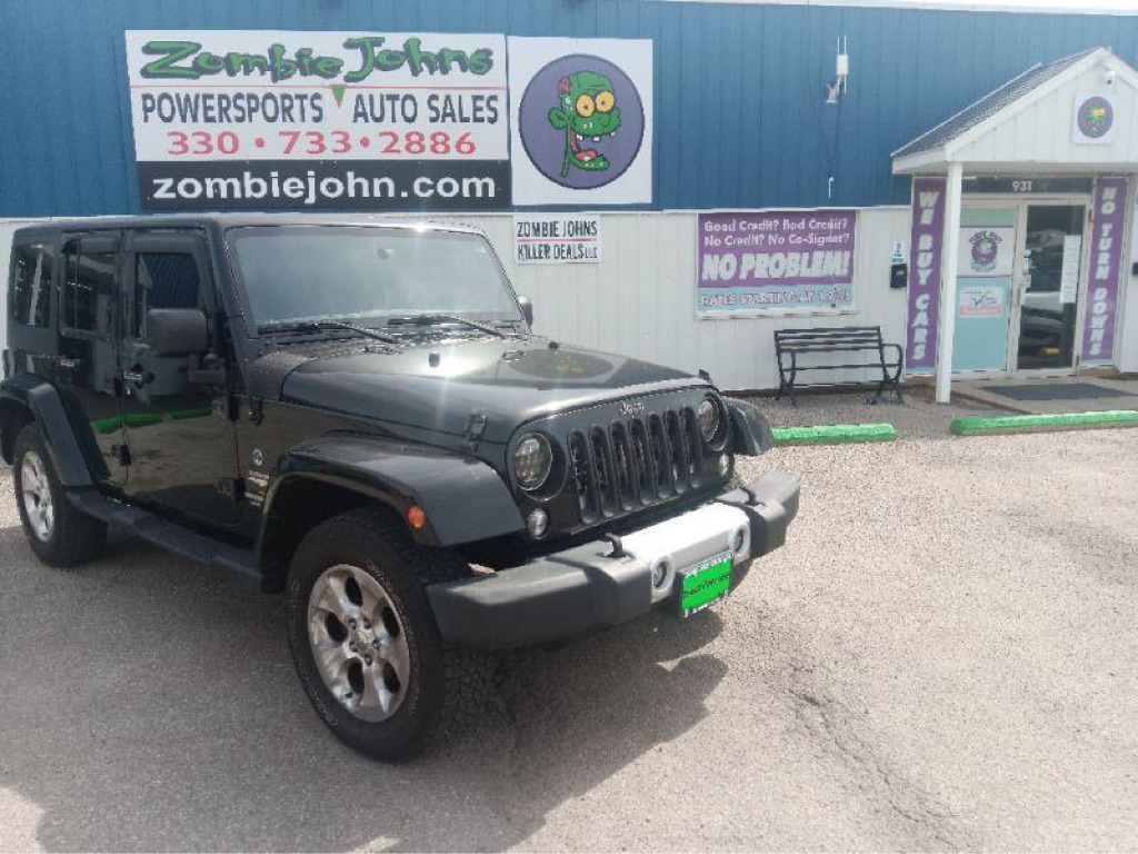 2015 JEEP WRANGLER UNLIMI SAHARA for sale at Zombie Johns