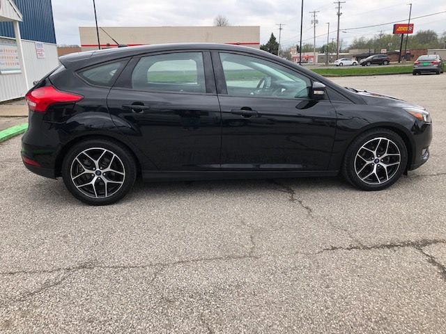 2017 FORD FOCUS SEL for sale at Zombie Johns