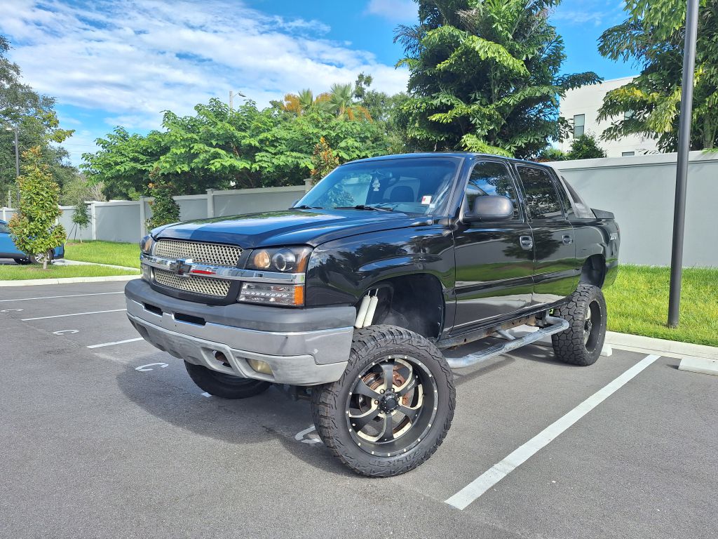 Black 2003 Chevrolet Avalanche Pickup Truck Four-Wheel Drive Automatic
