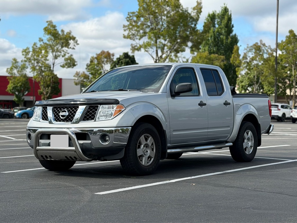 Silver 2006 Nissan Frontier Pickup Truck Rear-Wheel Drive Automatic