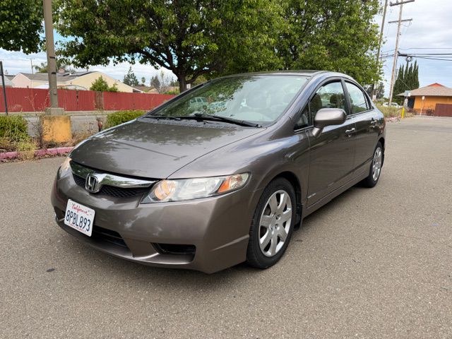 Brown 2011 Honda Civic LX Sedan Front-Wheel Drive Automatic